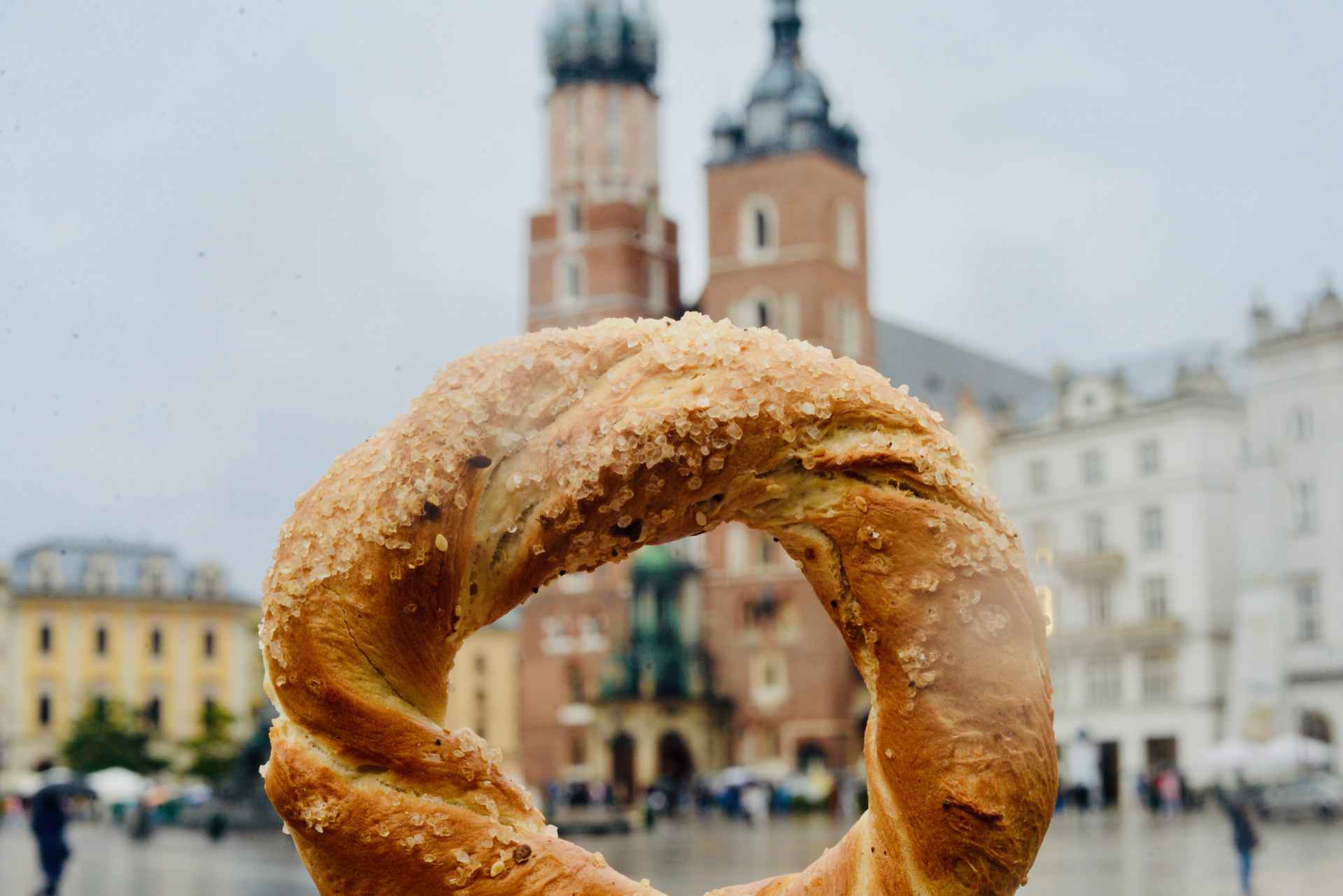 Kraków obwarzanek in front of St Mary's Basilica